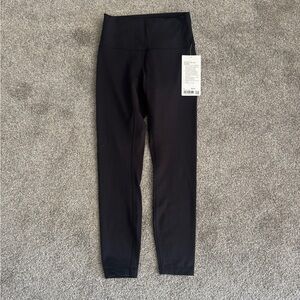 NWT size 6 Lululemon Wonder Train HR Black Legging 25”